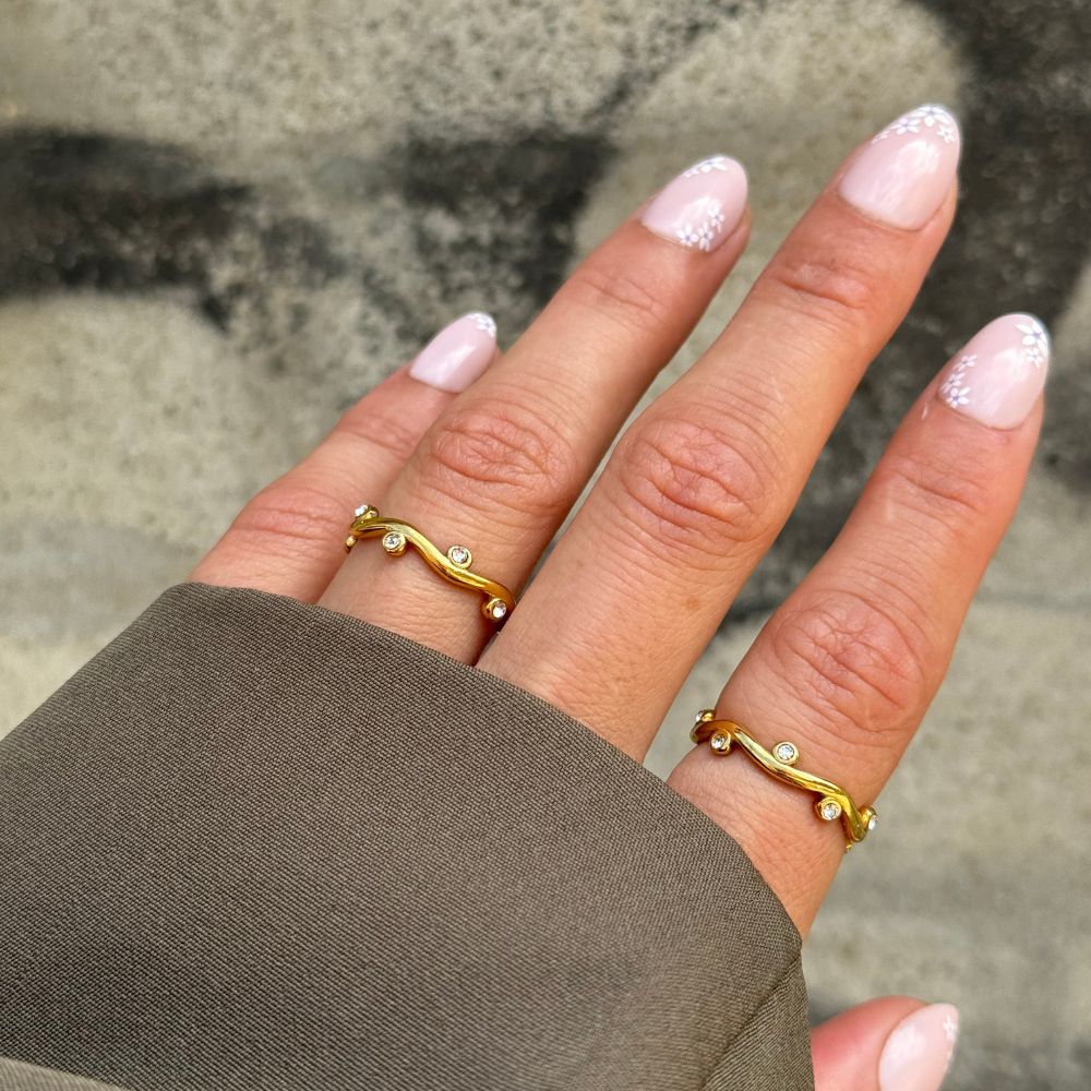 guld ring med sten