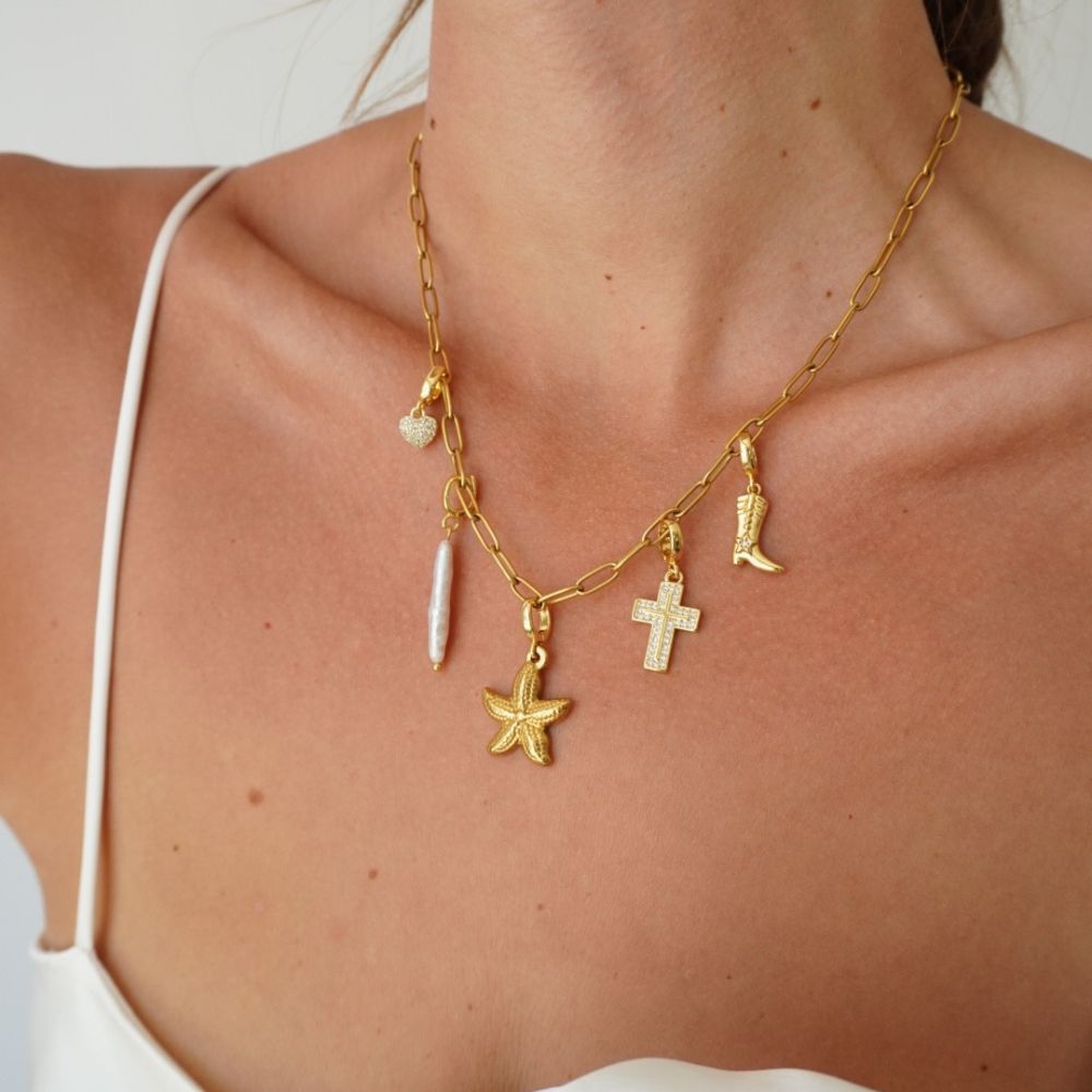 charm halskæde med starfish vedhæng i guld